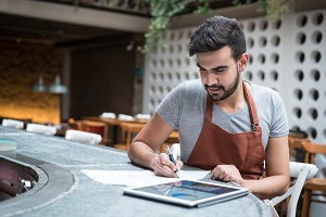 business owner working on paperwork